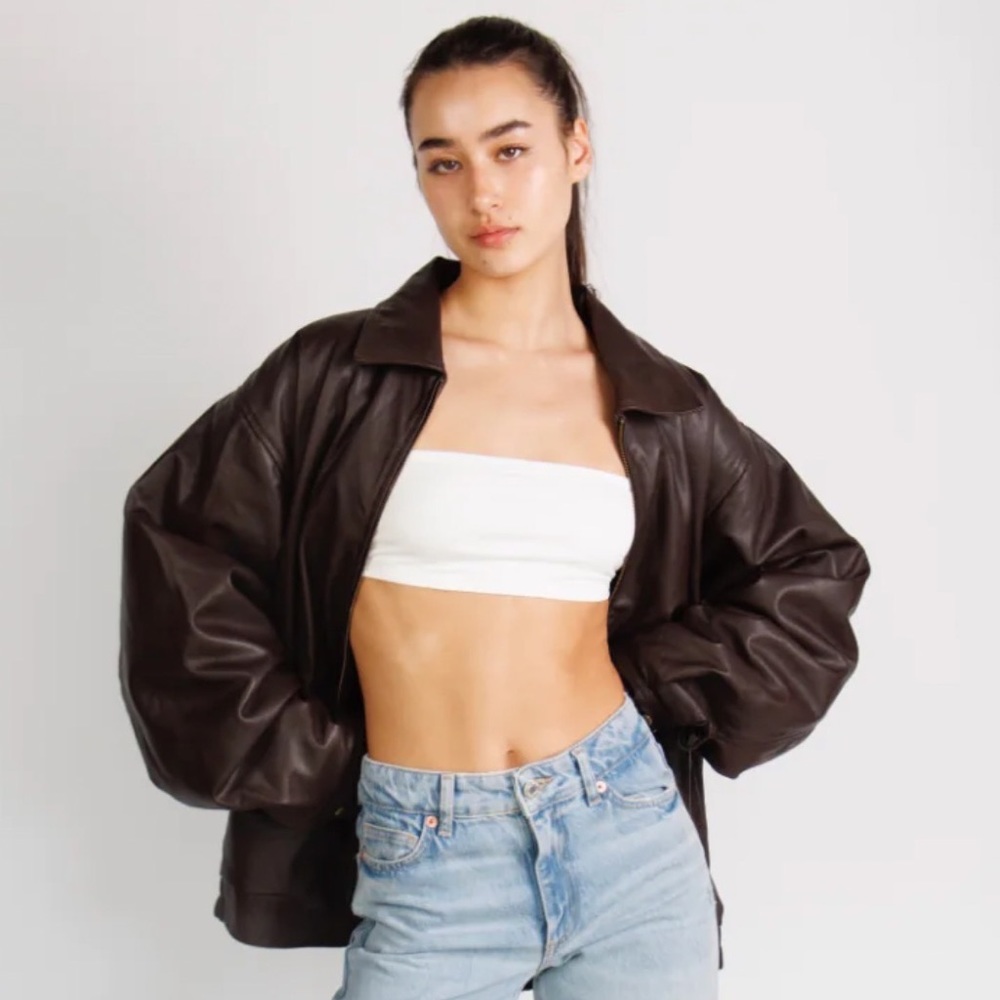 Brand new REAL brown leather jacket size small. Never worn, new with tags